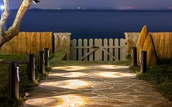 The path to the beach during the night.